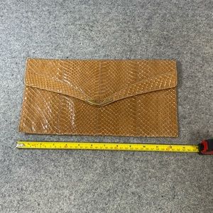 Snake skin clutch